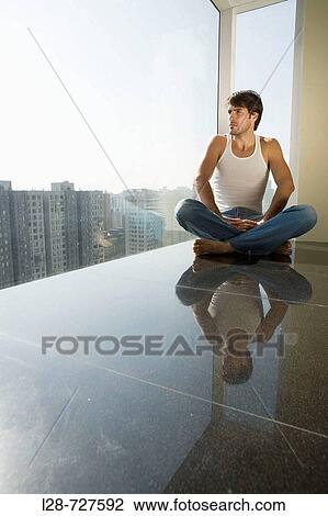 Young man relaxing View Large Photo Image Stock Image - Young man relaxing. Fotosearch