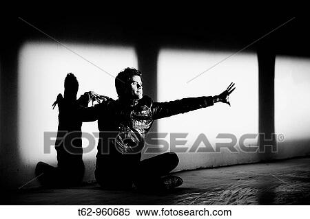 Young man resting happy and content Conceptual, black and white View Large Photo Image Stock Photography - Young man resting happy and content Conceptual, black and white. Fotosearch
