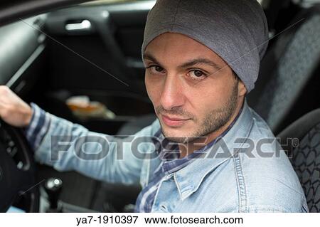 Young Man Sat In Car View Large Photo Image Stock Photo - Young Man Sat In Car. Fotosearch