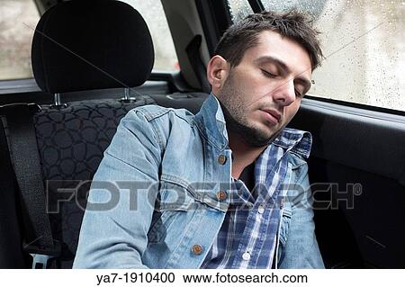 Young Man Sleeping in Car View Large Photo Image Stock Image - Young Man Sleeping in Car. Fotosearch