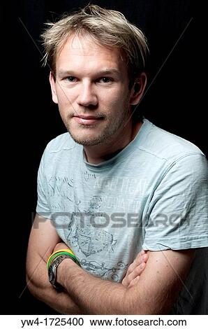 Young man smiling View Large Photo Image Stock Image - Young man smiling. Fotosearch