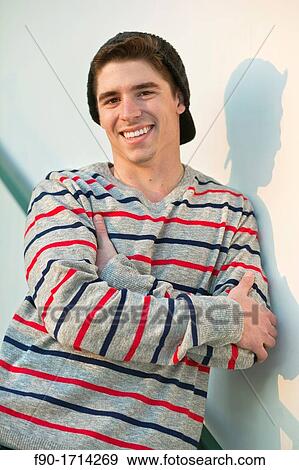 Stock Photo - Young man-stairs. Fotosearch