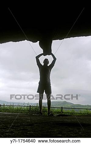 young man standing under broken pillar of Gandhar Pale Buddhist caves situated near Mahad, Buddhist caves built between 150 to 300 AC Mahad, Maharashtra, India View Large Photo Image Stock Image - young man standing under broken pillar of Gandhar Pale Buddhist caves situated near Mahad, Buddhist caves built between 150 to 300 AC Mahad, Maharashtra, India. Fotosearch