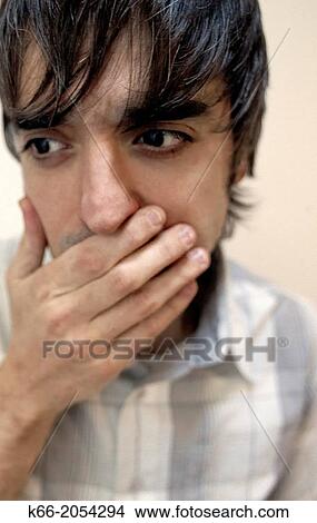 Picture - Young man thinking. Fotosearch