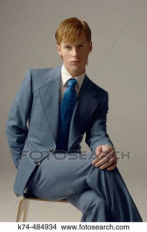 young man wearing a suit and tie View Large Photo Image Picture - young man wearing a suit and tie. Fotosearch