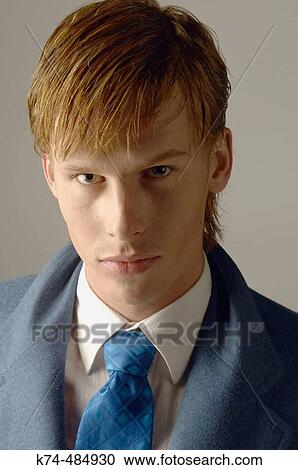 young man wearing a suit and tie View Large Photo Image Stock Image - young man wearing a suit and tie. Fotosearch