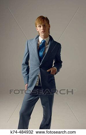 young man wearing a suit and tie View Large Photo Image Stock Image - young man wearing a suit and tie. Fotosearch