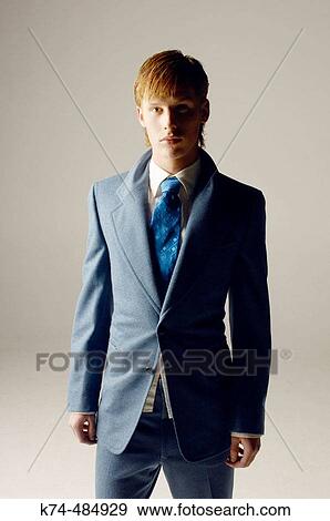 young man wearing a suit and tie View Large Photo Image Stock Photo - young man wearing a suit and tie. Fotosearch