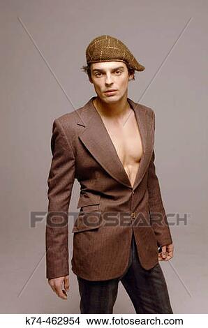 young man wearing suit jacket and no shirt View Large Photo Image Picture - young man wearing suit jacket and no shirt. Fotosearch