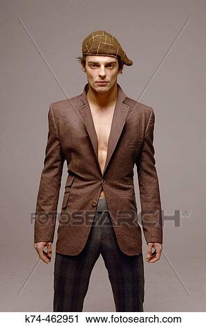 young man wearing suit jacket and no shirt View Large Photo Image Stock Image - young man wearing suit jacket and no shirt. Fotosearch