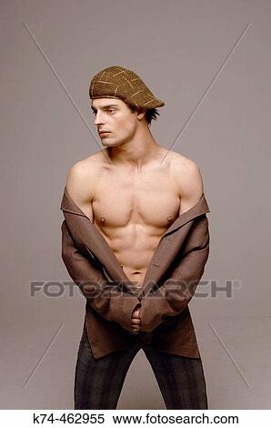 Stock Photography - young man wearing suit jacket and no shirt. Fotosearch