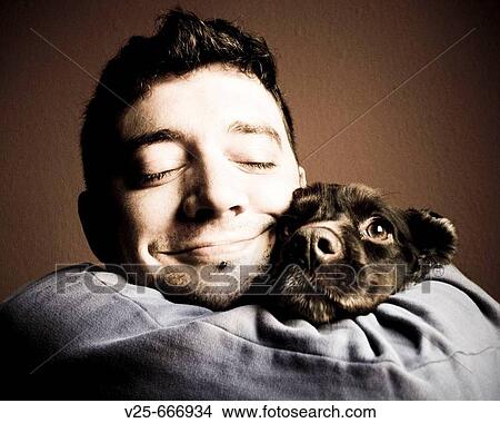 Picture - Young man with dog. Fotosearch