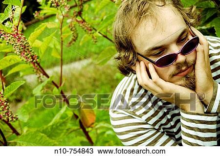 Young man with sunglasses, mustache, and a beard. View Large Photo Image Stock Image - Young man with sunglasses, mustache, and a beard.. Fotosearch