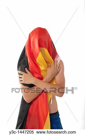 Young man wrapped in Germany flag View Large Photo Image Stock Photography - Young man wrapped in Germany flag. Fotosearch