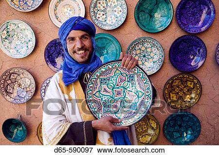 Stock Photo - Young Merchant in Blue Headress. Ensemble Artisanat. Ouarzazate. South of the High Atlas. Morocco. Fotosearch