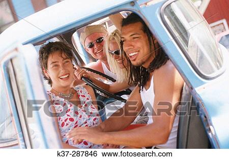 Young mixed group of adults in pickup truck View Large Photo Image Stock Photograph - Young mixed group of adults in pickup truck. Fotosearch