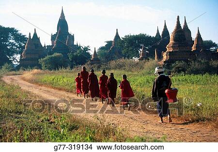 Picture - Young monks in morning alms. Bagan. Myanmar (Burma). Fotosearch