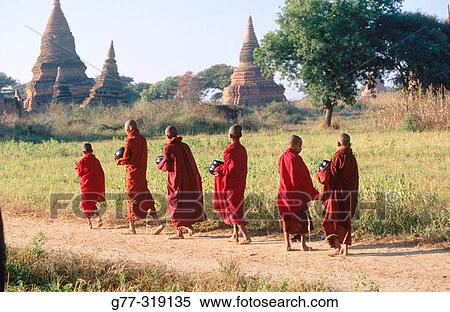 Young monks in morning alms. Bagan. Myanmar (Burma) View Large Photo Image Stock Photography - Young monks in morning alms. Bagan. Myanmar (Burma). Fotosearch