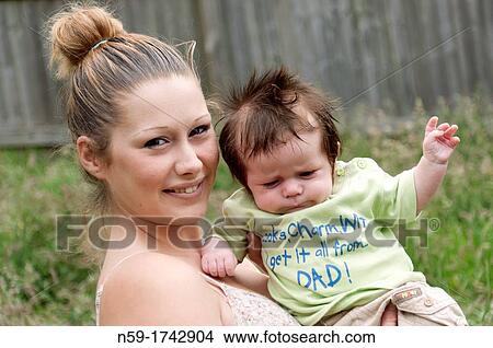 Young mother with 9 week old baby boy View Large Photo Image Picture - Young mother with 9 week old baby boy. Fotosearch