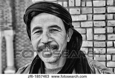 Young Muslim Arab man with turban in Algeria View Large Photo Image Stock Image - Young Muslim Arab man with turban in Algeria. Fotosearch