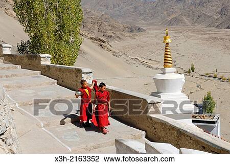 young novice monks at Tibetan Buddhist Thikse Monastery, near Leh, Ladakh region, state of Jammu and Kashmir, India, Asia View Large Photo Image Stock Image - young novice monks at Tibetan Buddhist Thikse Monastery, near Leh, Ladakh region, state of Jammu and Kashmir, India, Asia. Fotosearch