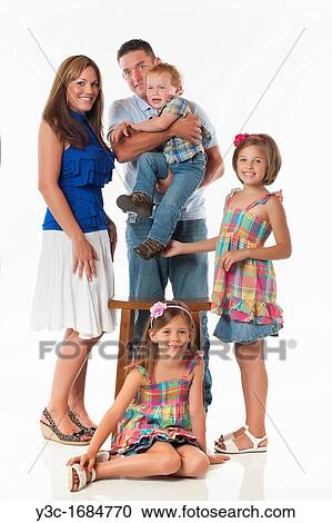 Stock Image - Young parents with their three children. Fotosearch