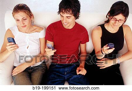 Young people, cell phones View Large Photo Image Stock Image - Young people, cell phones. Fotosearch