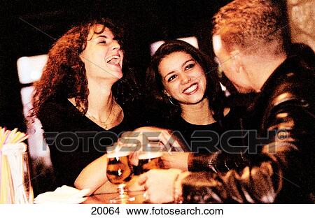 Young people drinking beer View Large Photo Image Picture - Young people drinking beer. Fotosearch