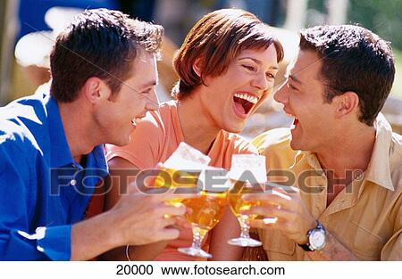 Young people drinking beer View Large Photo Image Stock Image - Young people drinking beer. Fotosearch