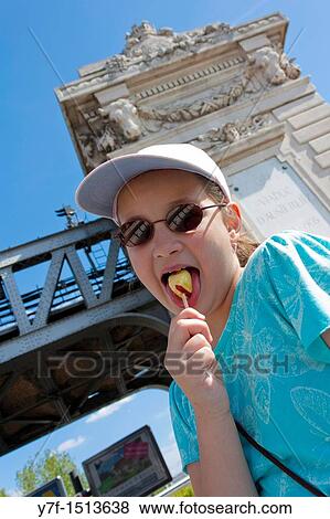 Young pretty teenager sucking a lolly View Large Photo Image Stock Photo - Young pretty teenager sucking a lolly. Fotosearch