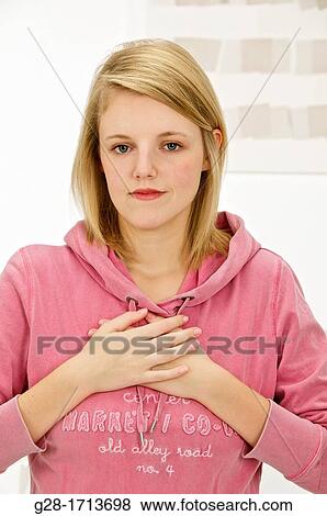 Stock Photo - young pretty woman out of breath suffering from asthma. Fotosearch