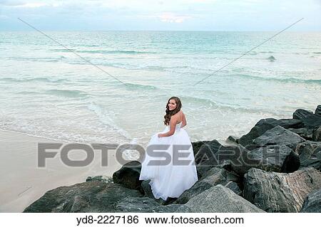 Young Quinceaera in Miami Beach at sunrise, FLorida, USA View Large Photo Image Stock Photograph - Young Quinceaera in Miami Beach at sunrise, FLorida, USA. Fotosearch