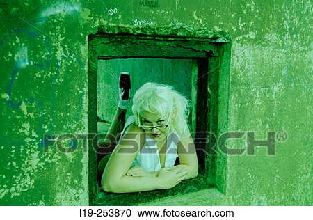 Young sexy woman in window View Large Photo Image Stock Image - Young sexy woman in window. Fotosearch