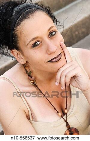 Young Spanish woman, eight months pregnant, posing. View Large Photo Image Stock Photo - Young Spanish woman, eight months pregnant, posing.. Fotosearch
