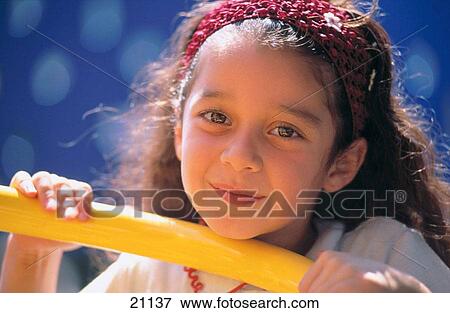 Young student on playground bars View Large Photo Image Stock Photo - Young student on playground bars. Fotosearch