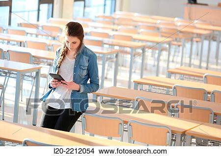 Young students at campus View Large Photo Image Picture - Young students at campus. Fotosearch