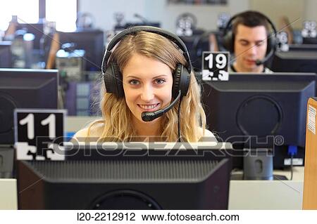 Stock Image - Young students at campus. Fotosearch