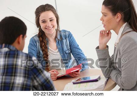 Stock Photo - Young students at campus. Fotosearch