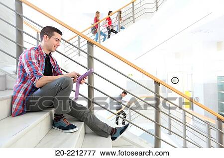 Young students at campus View Large Photo Image Stock Photo - Young students at campus. Fotosearch