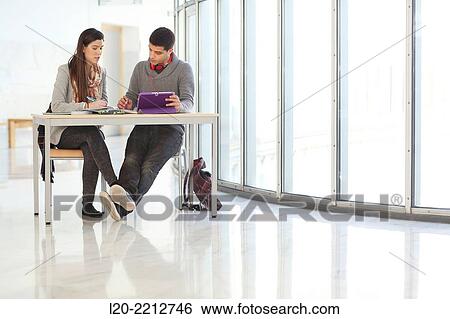 Stock Photograph - Young students at campus. Fotosearch