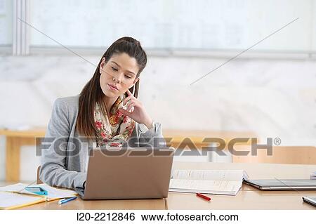 Stock Photograph - Young students at campus. Fotosearch