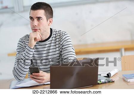 Stock Photograph - Young students at campus. Fotosearch