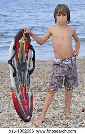 young surfer View Large Photo Image Stock Photograph - young surfer. Fotosearch