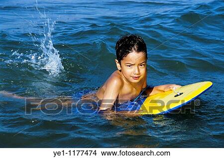 Young surfer waiting for a wave, Camargue, France. View Large Photo Image Picture - Young surfer waiting for a wave, Camargue, France.. Fotosearch