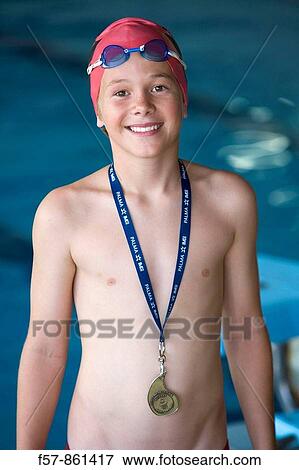Young swimmer with his medal View Large Photo Image Stock Photo - Young swimmer with his medal. Fotosearch