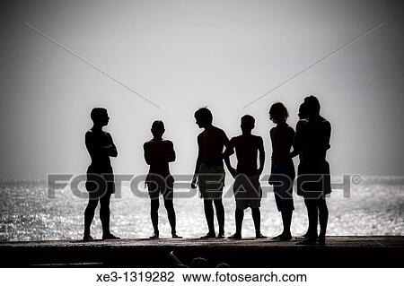 Stock Image - Young swimmers, Madeira, Portugal. Fotosearch