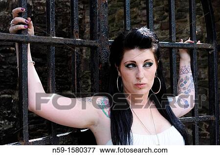 Young tatooed alternative woman View Large Photo Image Stock Photo - Young tatooed alternative woman. Fotosearch