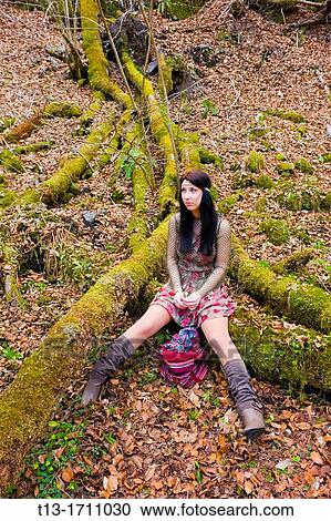 Young teen hippie style in the forest View Large Photo Image Stock Image - Young teen hippie style in the forest. Fotosearch