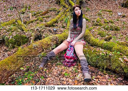 Young teen hippie style in the forest View Large Photo Image Stock Photo - Young teen hippie style in the forest. Fotosearch