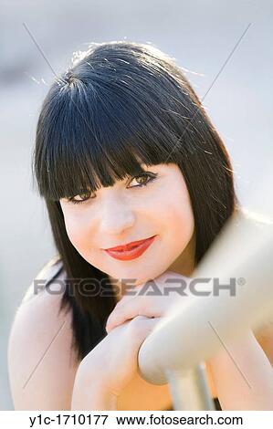 Stock Photo - Young teen portrait with Red lips. Fotosearch